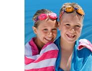 Decorative image of children drying themselves after a swim